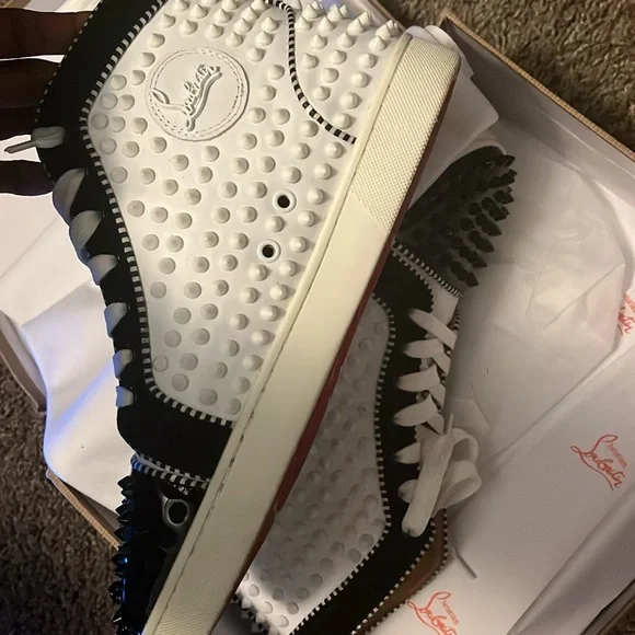 White and black “Christian Louboutin” Louis Flat Calf Spiked. Size 8 1/2.